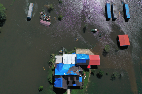 Flooded homes in a state of disrepair caused by flooding and storms in Lousiana.