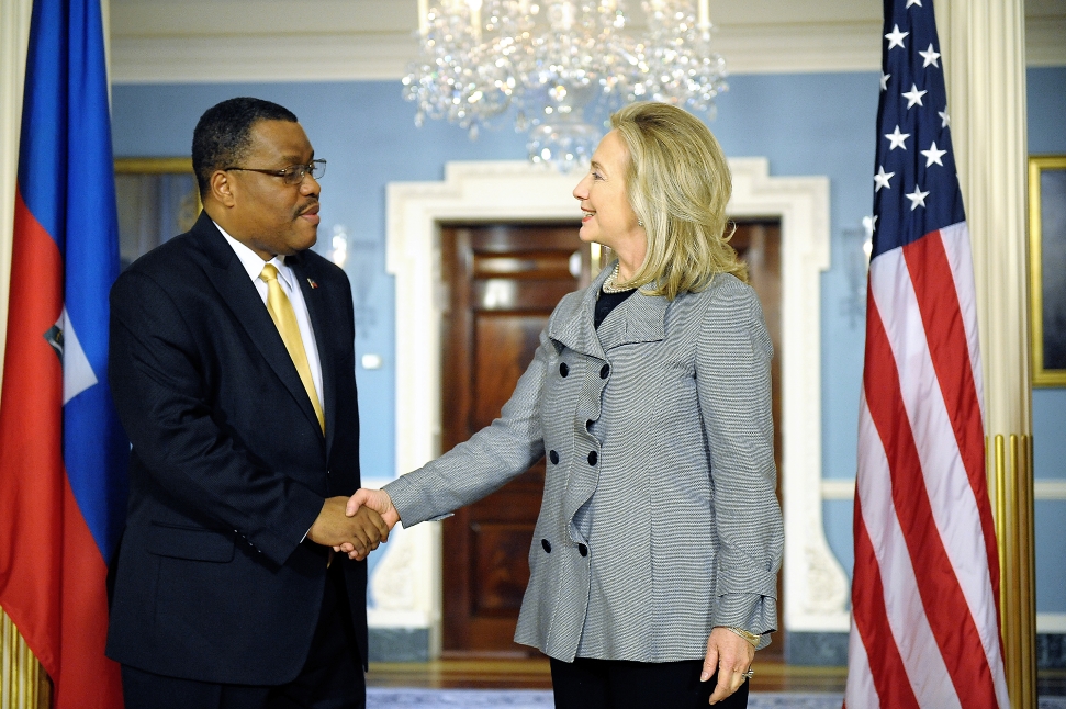 U.S. Secretary of State Hillary Rodham Clinton meets with Haiti Prime Minister Garry Conille at the U.S. Department of State in Washington, D.C., on February 8, 2012. [State Department photo/ Public Domain]