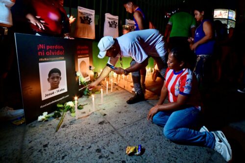 Luis Arroyo and Katy Bustos, parents of Ismael and Josue Arroyo, two of the four Ecuadorian teenagers apprehended by soldiers and found dead near a military base, attend an event a month after their apprehension in Guayaquil, Ecuador on January 8, 2025. (Photo by MARCOS PIN / AFP) (Photo by MARCOS PIN/AFP via Getty Images)