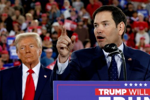 RALEIGH, NORTH CAROLINA - NOVEMBER 04: Republican presidential nominee, former U.S. President Donald Trump watches as U.S. Sen. Marco Rubio (R-FL) speaks during a campaign rally at the J.S. Dorton Arena on November 04, 2024 in Raleigh, North Carolina. (Photo by Chip Somodevilla/Getty Images)