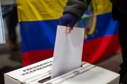 An Ecuadorian citizen living in Madrid casts his vote during the Ecuadorian general elections at the IFEMA exhibition centre. In Madrid, more than 60,000 registered Ecuadorian voters can exercise their right to vote in person from abroad. (Photo by Luis Soto/SOPA Images/LightRocket via Getty Images)