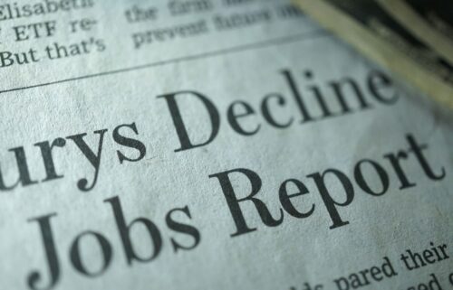 Close-up of a newspaper headline reading 