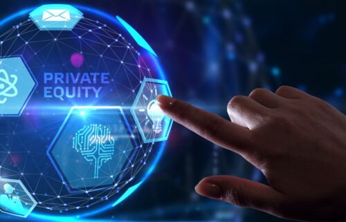 A hand reaches towards a glowing blue holographic interface labeled 
