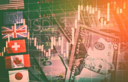 Collage of international currency symbols and flags overlaid with stock market charts and rising arrows, conveying a theme of trade and global finance.