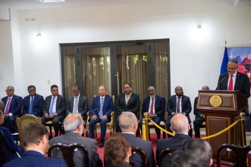 Haitian Prime Minister Alix Didier Fils-Aime (R) speaks during the inauguration ceremony of the Ministerial Cabinet, at the Villa D'acceuille in Port-au-Prince on November 16, 2024. On November 13, 2024, the Solino neighborhood fell under the control of the 