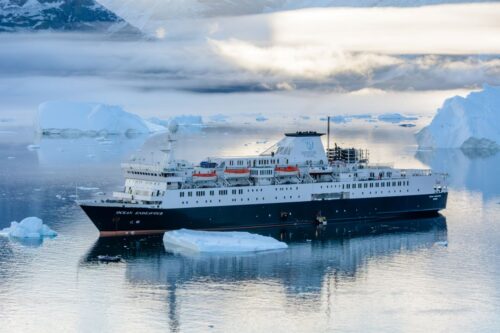 Expedition ship MS OCEAN ENDEAVOUR - IMO 7625811, under charter with Adventure Canada, at Qeqertarsuaq Island (Karrat Fjord), Greenland
