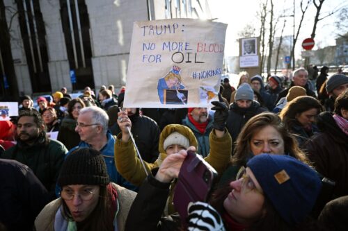 Hundreds of people gather in front of the U.S. Embassy holding signs and banners to protest the U.S. intervention in Venezuela in the city of Brussels, Belgium on January 04, 2025. Demonstrators carrying banners reading âNo war in Venezuelaâ and âVenezuela's oil belongs to Venezuelaâ demanded an end to the U.S. actions on Venezuela. (Photo by Dursun Aydemir/Anadolu via Getty Images)