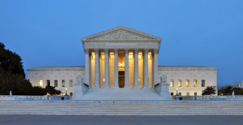 Panorama of the west facade of United States Supreme Court Building at dusk in Washington, D.C., United States of America. Joe Ravi