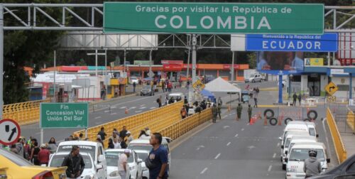 Vehicles wait to cross the Rumichaca International Bridge connecting Colombia and Ecuador, as seen from Ipiales, Colombia. (Photo by Leonardo CASTRO / AFP) (Photo by LEONARDO CASTRO/AFP via Getty Images)