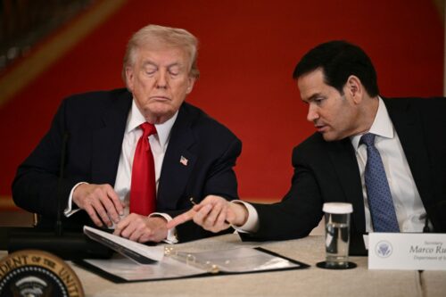 US President Donald Trump and Secretary of State Marco Rubio speak during a roundtable to 