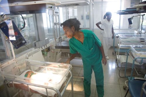 Nurses care for newborns in a Cuban hospital maternity ward. (Photo by robert wallis/Corbis via Getty Images)