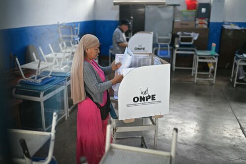 People vote at a school in Lima on April 13, 2026, after logistical failures prevented tens of thousands of people from voting in presidential and legislative elections the day before. Peru's Keiko Fujimori looked set to face a runoff against a conservative rival after a troubled first-round presidential election on April 12, 2026 marred by logistics foul-ups, police raids and allegations of fraud. (Photo by ERNESTO BENAVIDES / AFP via Getty Images)