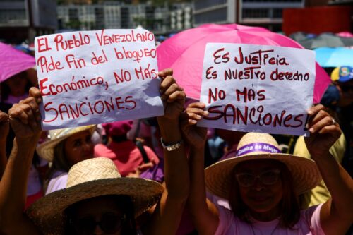 Supporters of the ruling party participate in a march to demand the lifting of sanctions on Venezuela by President Donald Trump, in Caracas, Venezuela, on March 23, 2026. (Photo by Javier Campos/NurPhoto via Getty Images)