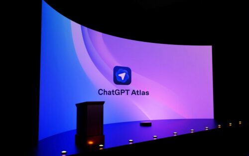 A large, curved screen displays 