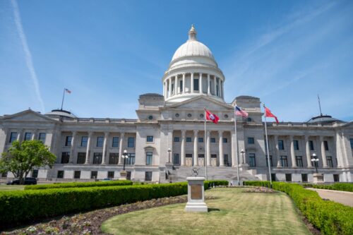 The Arkansas State Capitol is a significant landmark located in Little Rock, Arkansas, USA. This stately building, designed in the Neo-classical style, serves as the home of the Arkansas General Assembly and the seat of the state government. Visitors can admire its Arkansas granite construction, bronze doors, and Tiffany's chandeliers. The Capitol's grounds also feature important memorials, including the Civil Rights Memorial for the Little Rock Nine and the Vietnam Veterans' Memorial.