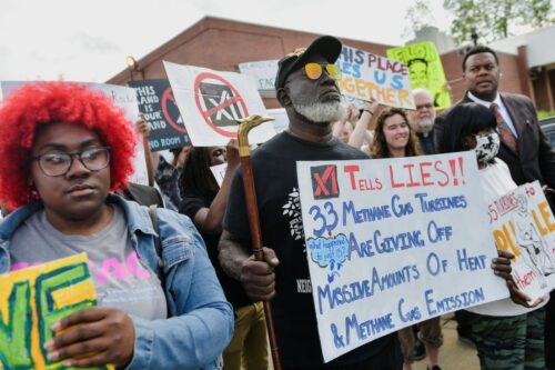 MEMPHIS, TN - APRIL 25: Demonstrators rally in opposition to a plan by Elon Musks's xAI to use gas turbines for a new data center rally ahead of a public comment meeting on the project at Fairley High School in Memphis, TN on April 25, 2025. (Photo by Brandon Dill for The Washington Post via Getty Images)