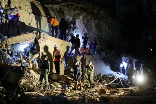 CARACAS, VENEZUELA - JUNE 24: First responders attend a damaged building at Los Palos Grandes after a magnitude 7.2 earthquake struck Venezuela and other regions in the Caribbean on June 24, 2026 in Caracas, Venezuela. According to the U.S. Geological Survey (USGS), the main earthquake was followed by a 7.5-magnitude aftershock less than a minute later; although some buildings collapsed, the number of victims remains unknown. (Photo by Jesus Vargas/Getty Images)
