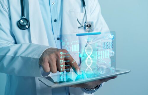 A physician presents a tablet showing a digital DNA image, highlighting the integration of AI in medical diagnostics.
